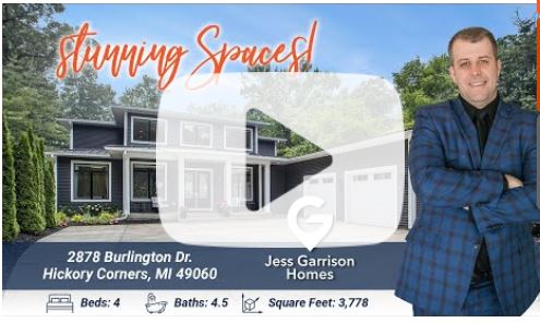 Elegant modern home exterior at 2878 Burlington Dr., Hickory Corners, MI, showcasing contemporary architecture with lush landscaping and spacious driveway.