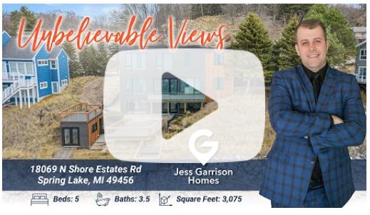 Elegant new home with modern design and stunning views in Spring Lake, MI by Jess Garrison Homes.